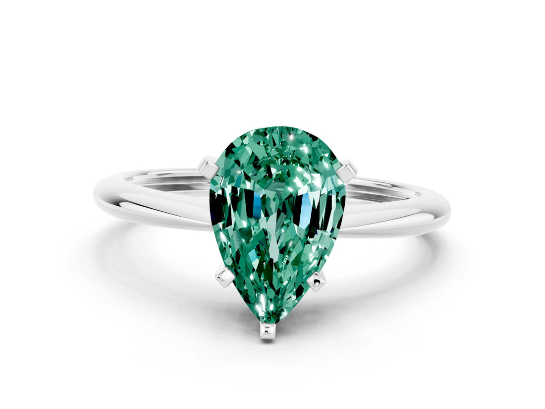 Platinum Pear Cut Green Sapphire Solitaire Engagement Ring with Classic Band and Four-Prong Setting_12