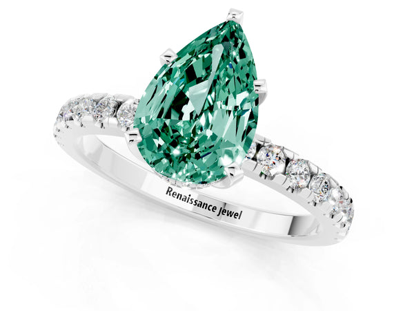 Platinum Pear Cut Green Sapphire Solitaire Ring with Round Pavé Band and Four-Prong Setting