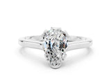 Platinum Pear Cut Moissanite Solitaire Ring with Flower Prong Setting and Classic Band