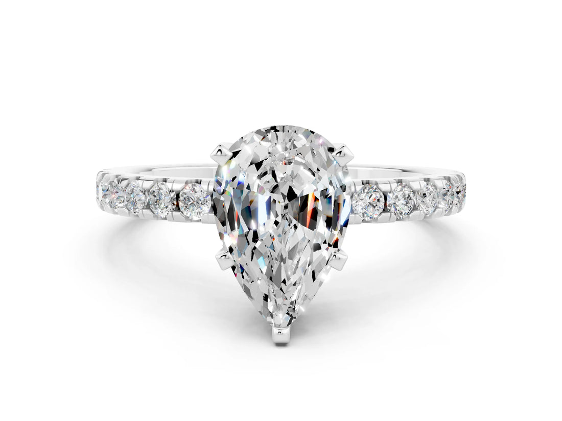 Platinum Pear Cut Moissanite Solitaire Ring with Round  Pavé Band and Four-Prong Setting_48