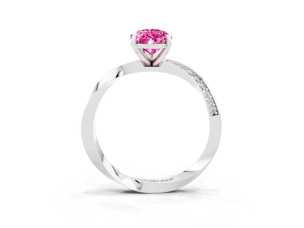 Platinum Pear Cut Pink Sapphire Engagement Ring with Side Stone Accents and Four-Prong Setting