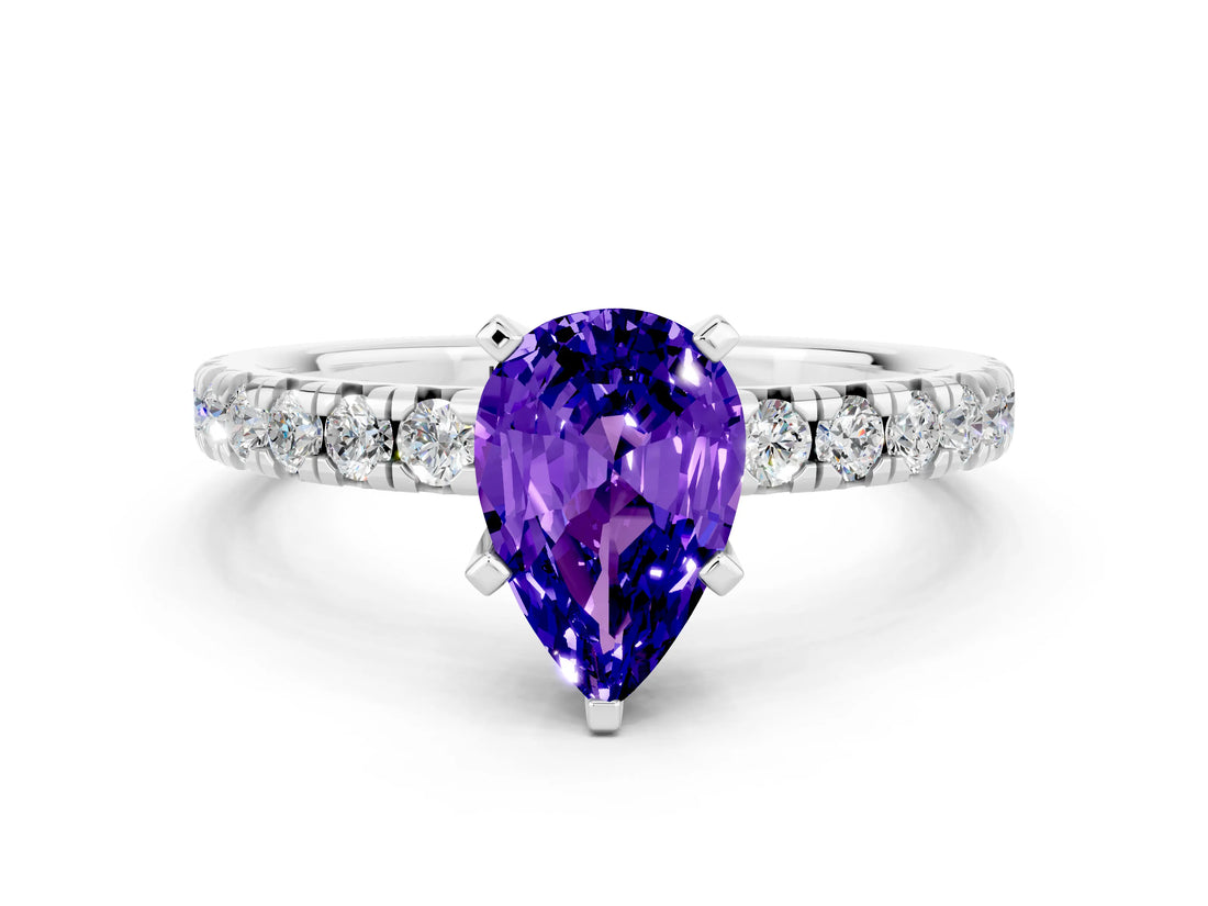 Platinum Pear Cut Tanzanite Solitaire Pavé Engagement Ring with Round Band and Prong Setting_84