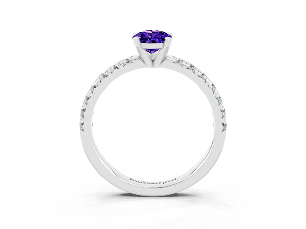 Platinum Pear Cut Tanzanite Solitaire Pavé Engagement Ring with Round Band and Prong Setting