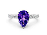 Platinum Pear Cut Tanzanite Solitaire Ring with Round  Pavé Band and Four-Prong Setting_24