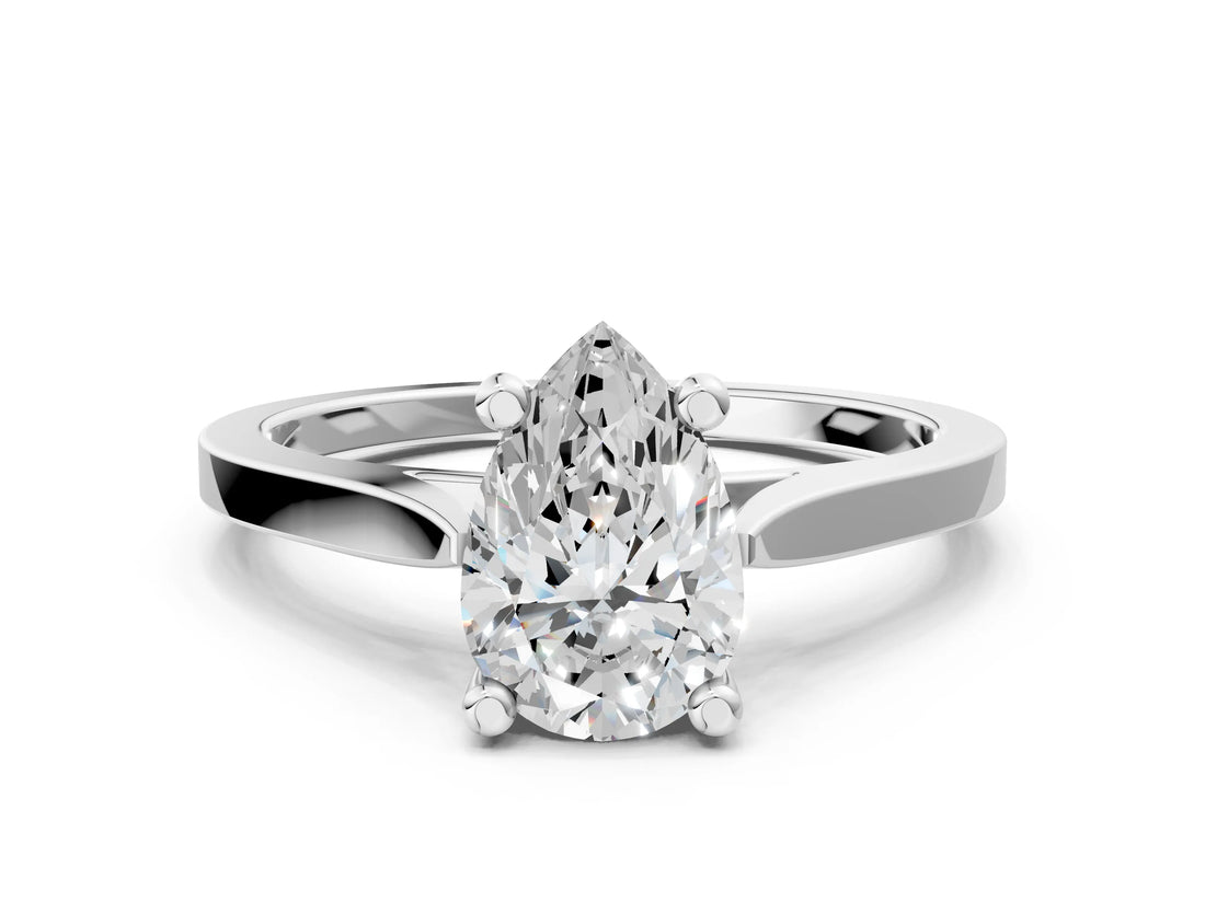 Platinum Pear Solitaire Diamond Ring with Four-Prong Setting and Tapered Band 1