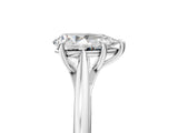 Platinum Pear Solitaire Engagement Ring with Four-Prong Setting and Classic Band