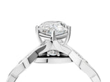 Platinum Pear Solitaire Twist Band with Leaf Prong Setting 5