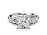 Platinum Princess Brilliant Solitaire with Side Stones on a Pave Band and Four-Prong Setting_14