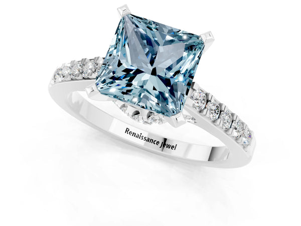 Platinum Princess Cut Aquamarine Solitaire Ring with Crossover Gallery and Round  Pavé Band
