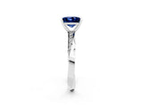 Platinum Princess Cut Blue Sapphire Engagement Ring with Side Stone Accents and Four-Prong Setting_26