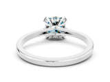 Platinum Princess Cut Blue Topaz Solitaire Ring with Flower Prong Setting and Classic Band