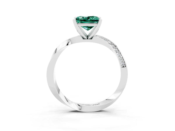 Platinum Princess Cut Green Sapphire Engagement Ring with Side Stone Accents and Four-Prong Setting