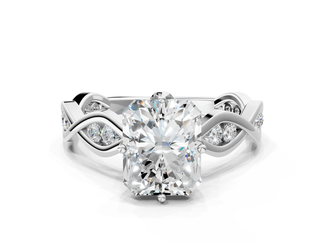 Platinum Radiant Solitaire Twist Band with Leaf Prong Setting