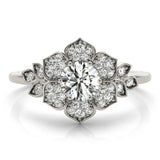 Platinum Round Brilliant Diamond Floral Halo Ring with Pavé Band and Four-Prong Setting 1