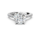 Platinum Round Brilliant Diamond Solitaire with Pavé Band and Four-Prong Setting
