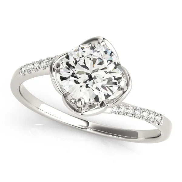 Platinum Round Brilliant Solitaire with Pavé Band and Four-Prong Cushion Setting