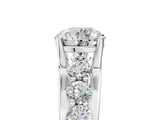 Platinum Round Brilliant Solitaire with Side Stones on a Pave Band and Four-Prong Setting_15