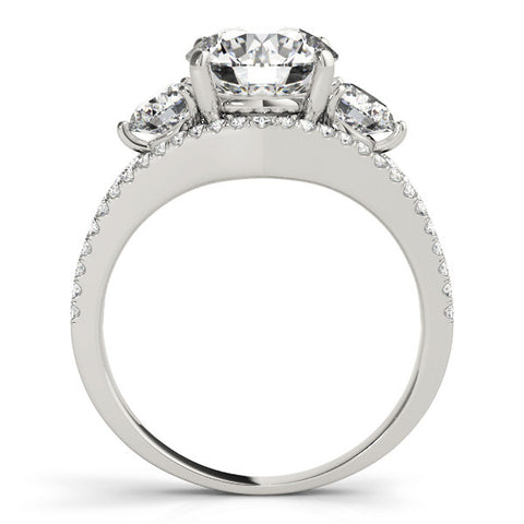Platinum Round Brilliant Three-Stone Diamond Ring with Pavé Band and Prong Setting 1
