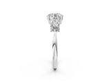 Platinum Round Brilliant Three-Stone Ring with Pear Side Stones and Four-Prong Setting_19