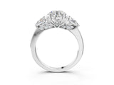 Platinum Round Brilliant Three-Stone Ring with Pear Side Stones and Four-Prong Setting_20