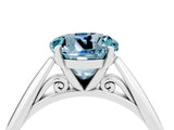 Platinum Round Cut Aquamarine Solitaire Engagement Ring with Cathedral Setting and Four-Prong Mount_16