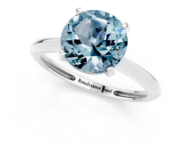 Platinum Round Cut Aquamarine Solitaire Engagement Ring with Classic Band and Four-Prong Setting