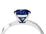 Platinum Round Cut Blue Sapphire Engagement Ring with Side Stone Accents and Four-Prong Setting_16