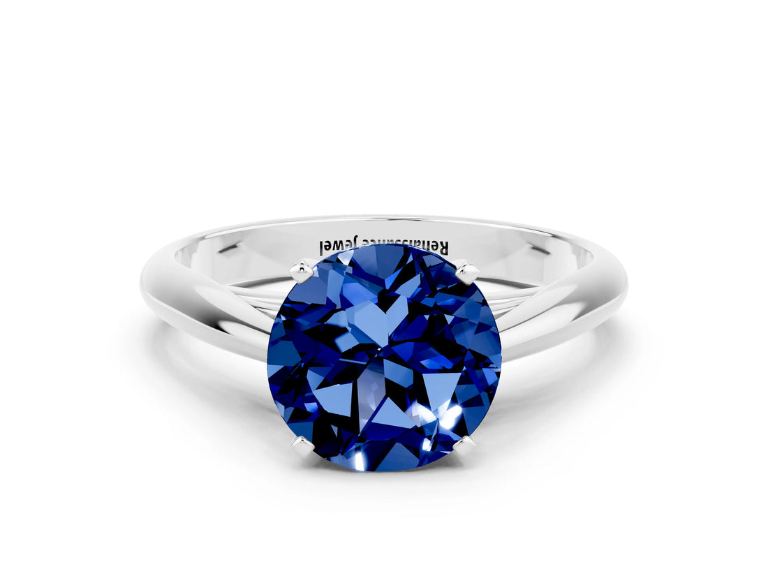 Platinum Round Cut Blue Sapphire Solitaire Engagement Ring with Cathedral Setting and Four-Prong Mount_12