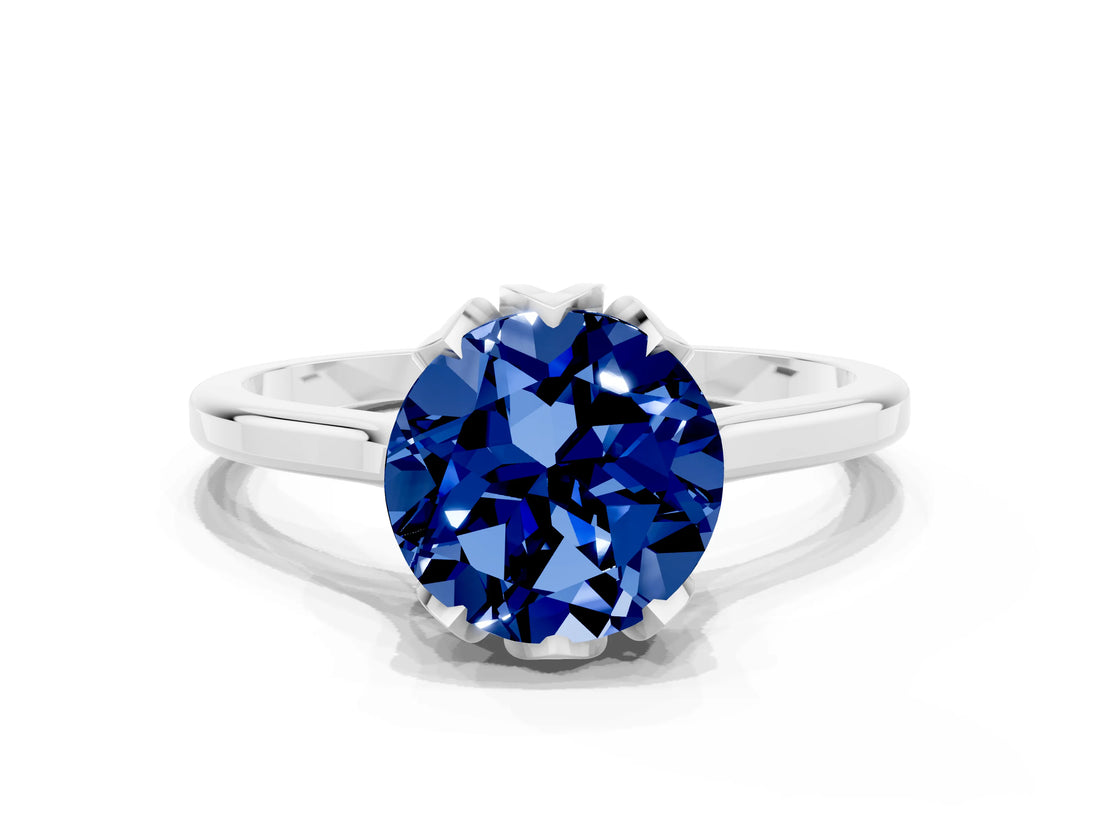Platinum Round Cut Blue Sapphire Solitaire Ring with Flower Prong Setting and Classic Band