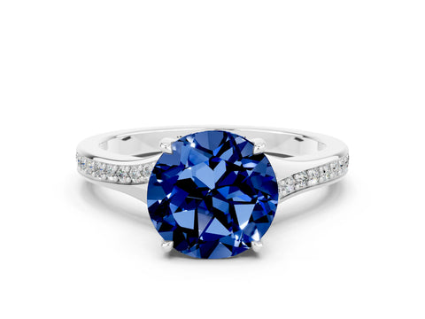 Platinum Round Cut Blue Sapphire Solitaire Ring with Pavé Band and Prong Setting_12