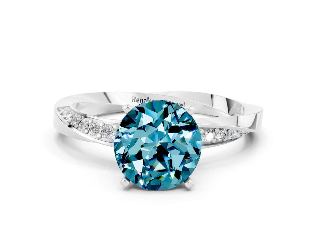 Platinum Round Cut Blue Topaz Engagement Ring with Side Stone Accents and Four-Prong Setting_24