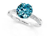 Platinum Round Cut Blue Topaz Engagement Ring with Side Stone Accents and Four-Prong Setting_25