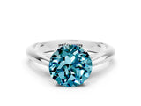 Platinum Round Cut Blue Topaz Solitaire Engagement Ring with Cathedral Setting and Four-Prong Mount_12