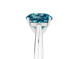 Platinum Round Cut Blue Topaz Solitaire Engagement Ring with Cathedral Setting and Four-Prong Mount_17