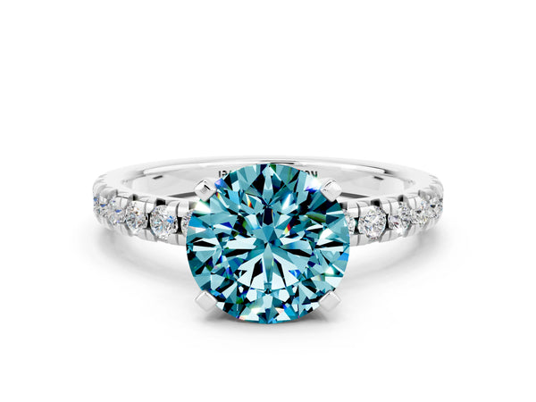 Platinum Round Cut Blue Topaz Solitaire Pavé Engagement Ring with Round Band and Prong Setting