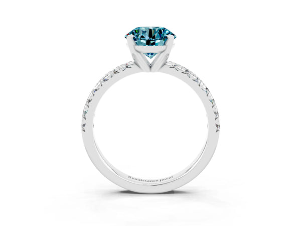 Platinum Round Cut Blue Topaz Solitaire Pavé Engagement Ring with Round Band and Prong Setting