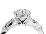 Platinum Round Cut Diamond Ring with Baguette Side Stones, Channel Set Band, and Four-Prong Setting_29