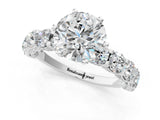 Platinum Round Cut Diamond Side Stone Engagement Ring with Four-Prong Setting_9