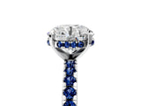 Platinum Round Cut Diamond Solitaire Ring with Round with Blue Sapphire side stone Pavé Band and Four-Prong Setting_17