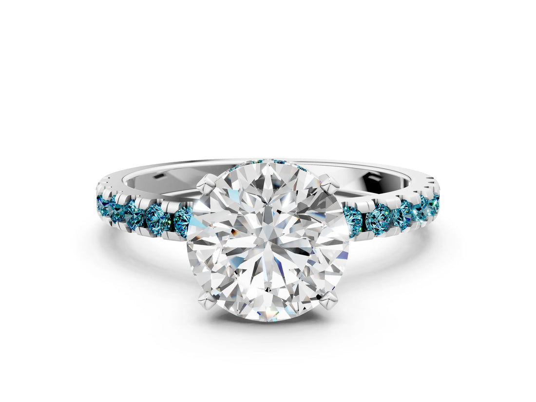 Platinum Round Cut Diamond Solitaire Ring with Round with Blue Topaz side stone Pavé Band and Four-Prong Setting_12