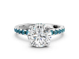 Platinum Round Cut Diamond Solitaire Ring with Round with Blue Topaz side stone Pavé Band and Four-Prong Setting_12