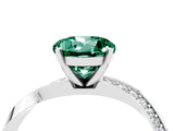 Platinum Round Cut Green Sapphire Engagement Ring with Side Stone Accents and Four-Prong Setting_28