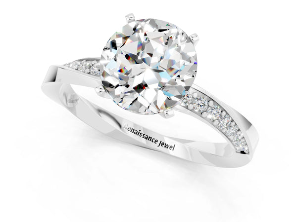 Platinum Round Cut Moissanite Engagement Ring with Side Stone Accents and Four-Prong Setting