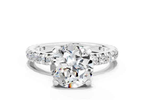Platinum Round Cut Moissanite Pavé Solitaire Ring with Round Band and Prong Setting