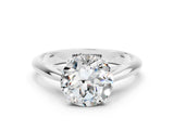 Platinum Round Cut Moissanite Solitaire Engagement Ring with Cathedral Setting and Four-Prong Mount_12