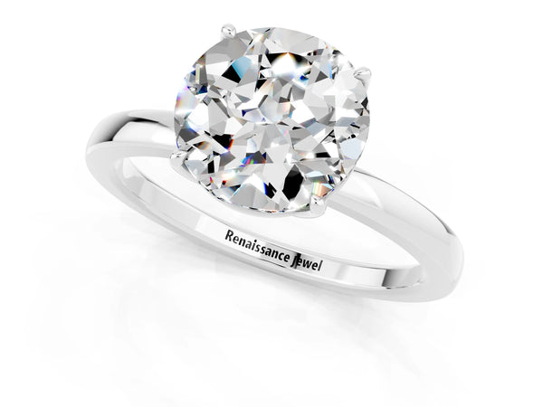 Platinum Round Cut Moissanite Solitaire Ring with Thin Band and Prong Setting