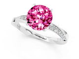 Platinum Round Cut Pink Sapphire Engagement Ring with Side Stone Accents and Four-Prong Setting_13