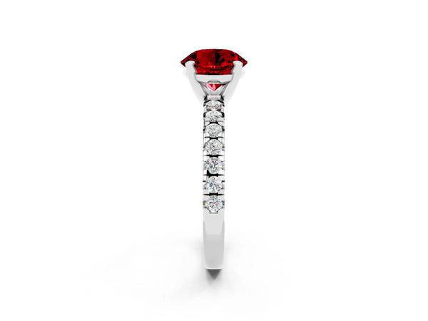 Platinum Round Cut Ruby Solitaire Pavé Engagement Ring with Round Band and Prong Setting