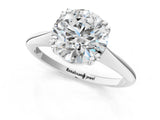 Platinum Round Cut Solitaire Diamond Ring with Six-Prong Setting and Classic Band_7