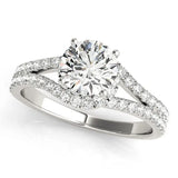 Platinum Round Cut Solitaire Diamond with Pavé Twist Band and Four-Prong Setting